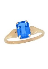 convenient teeny-tiny yellow gold blue topaz baby birthstone ring 